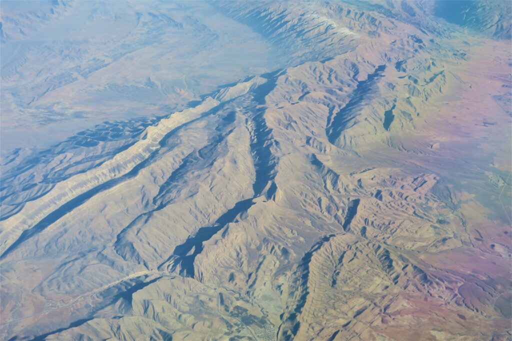 aerial view of snow covered mountains during daytime