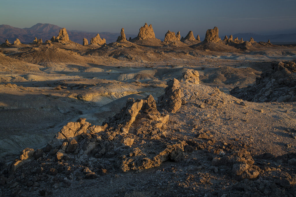 Tufa spires rising from the dry lakebed at Trona Pinnacles in the Mojave Desert, California